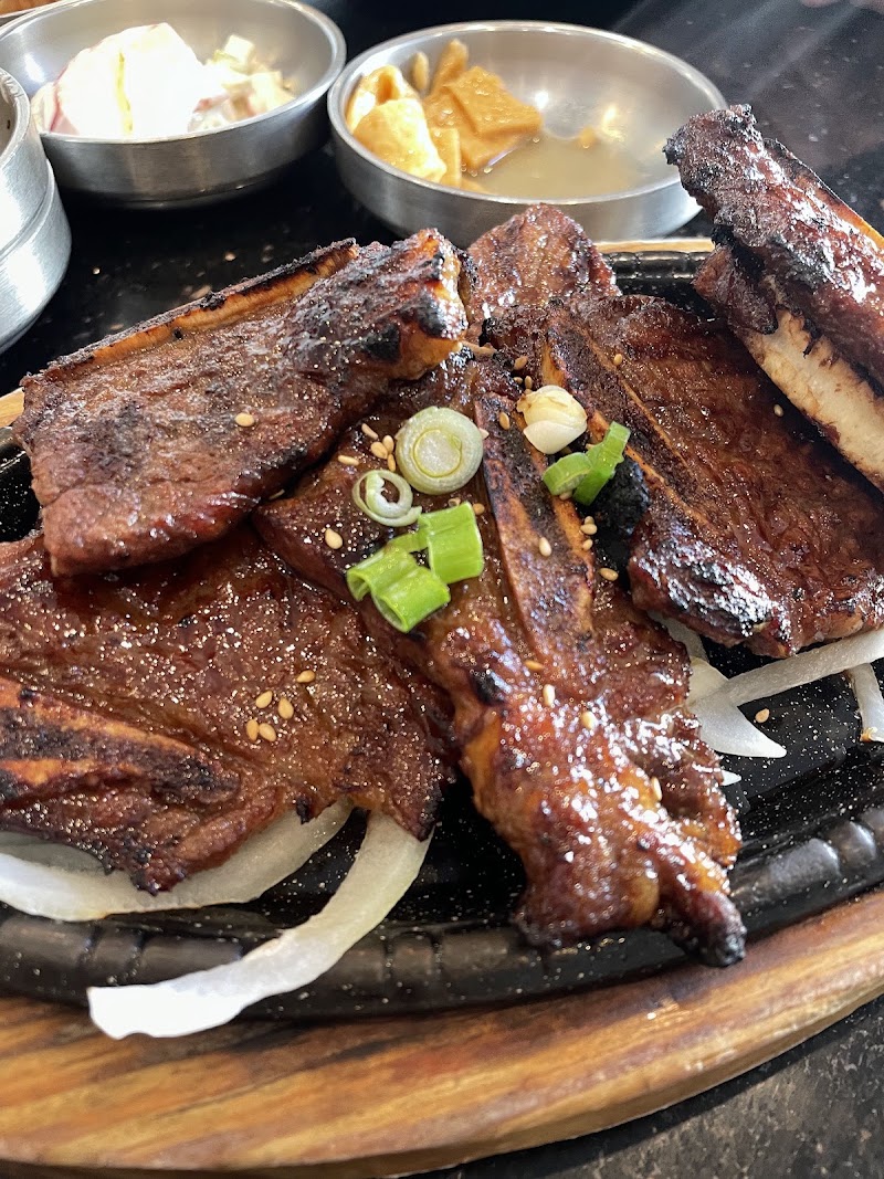 Glazed grilled ribs, sizzling hot