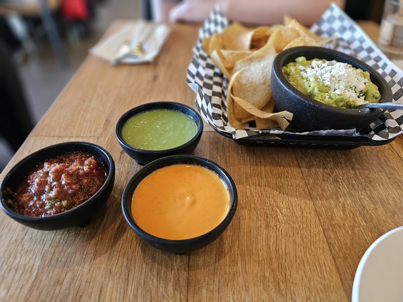 Chips, guac, three salsas