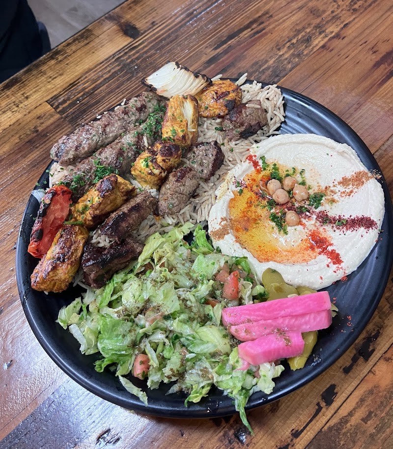 Mixed grill platter with hummus