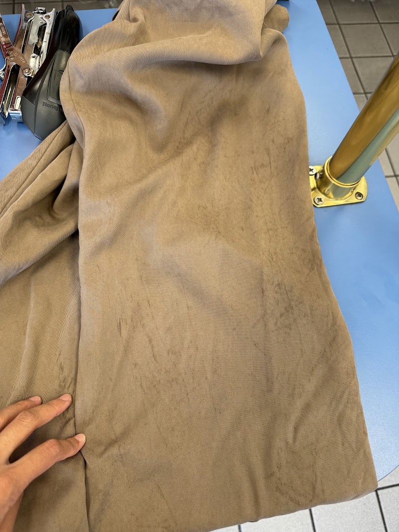 Stained garment awaiting expert care