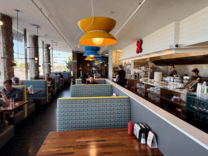 Lively booths, open kitchen