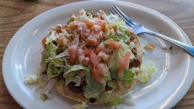 Loaded carnitas tostada plate