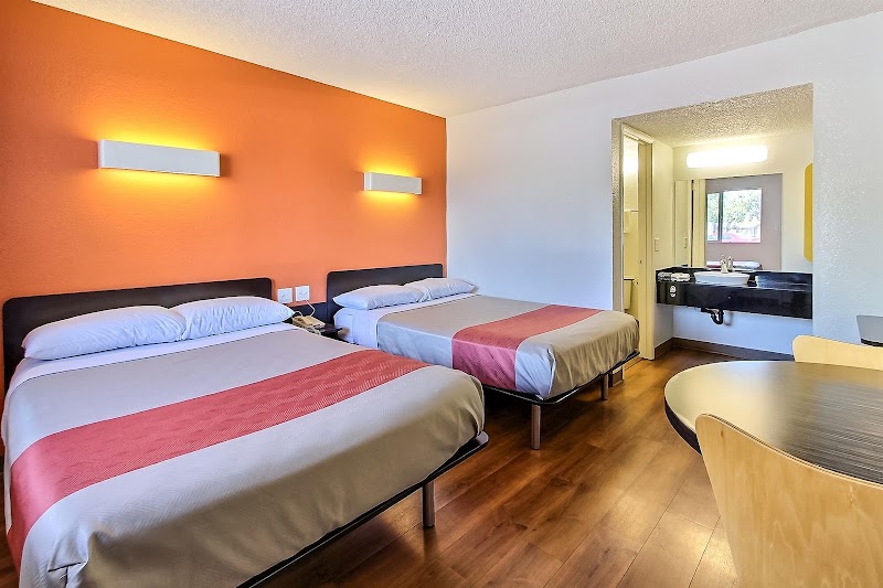 Comfortable twin beds, warm lighting