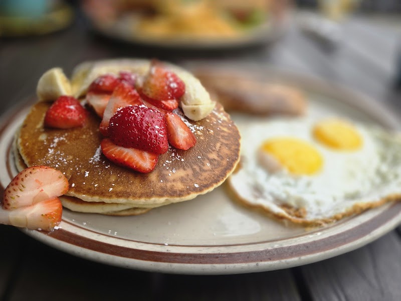 Pancakes with sunny eggs