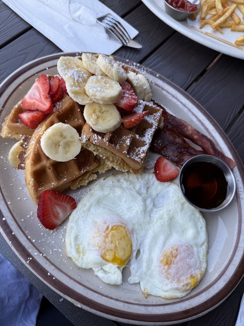 Waffles, eggs, bacon plate