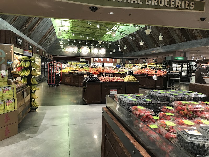Bright produce-filled store floor