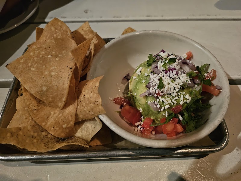 Fresh guacamole with tortilla chips