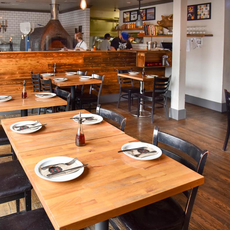 Wood-fired kitchen, warm tables