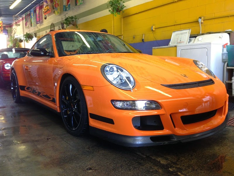 Orange Porsche getting detailed
