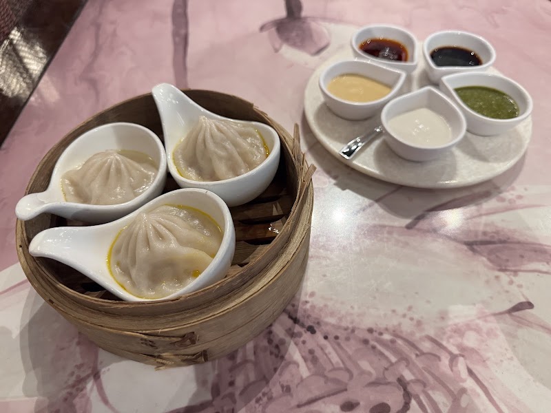 Sichuan seafood dumplings, golden broth