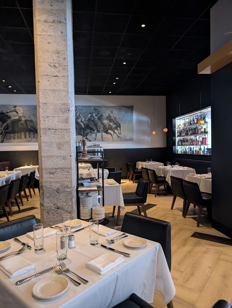 Classic tables, curated wine wall