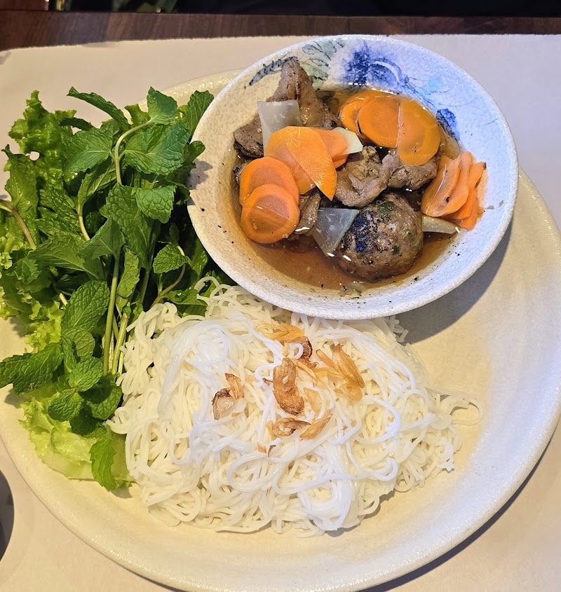 Bún bò with fresh herbs