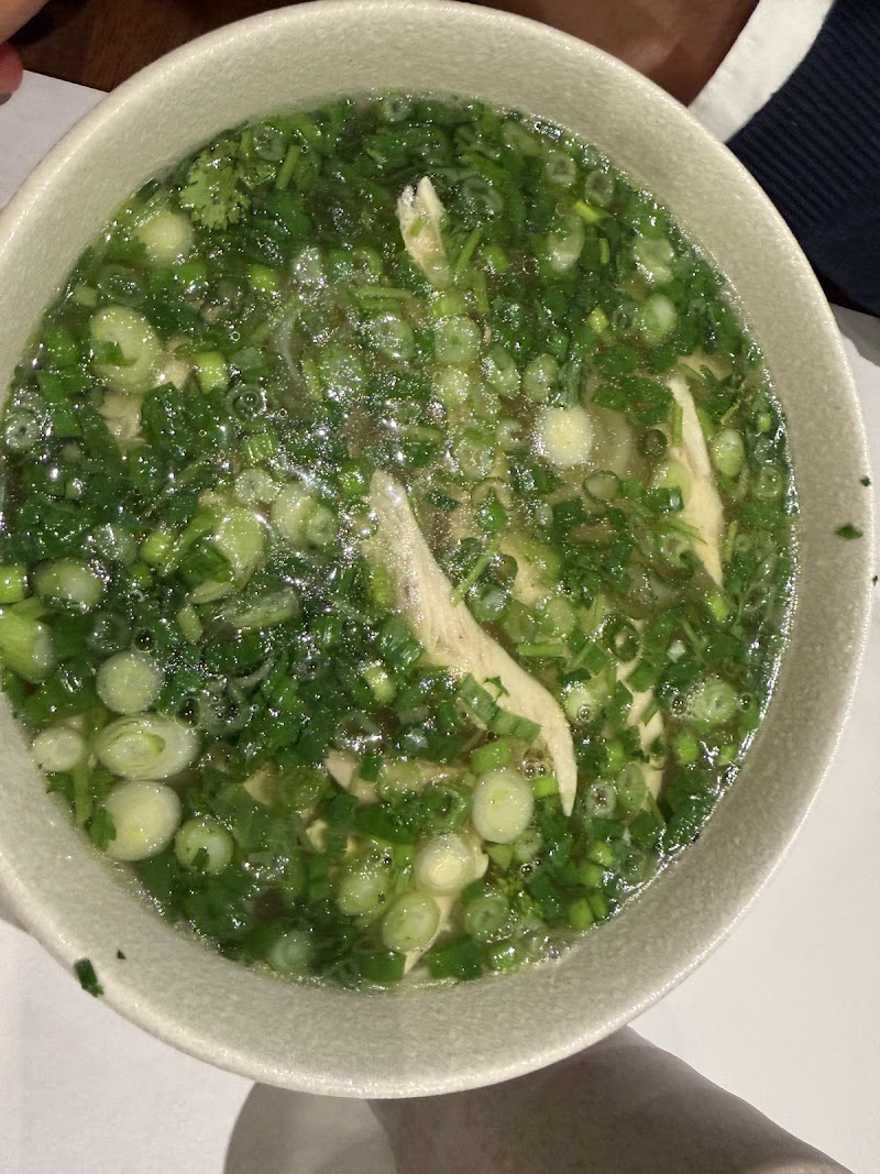 Chicken pho, herb-topped broth