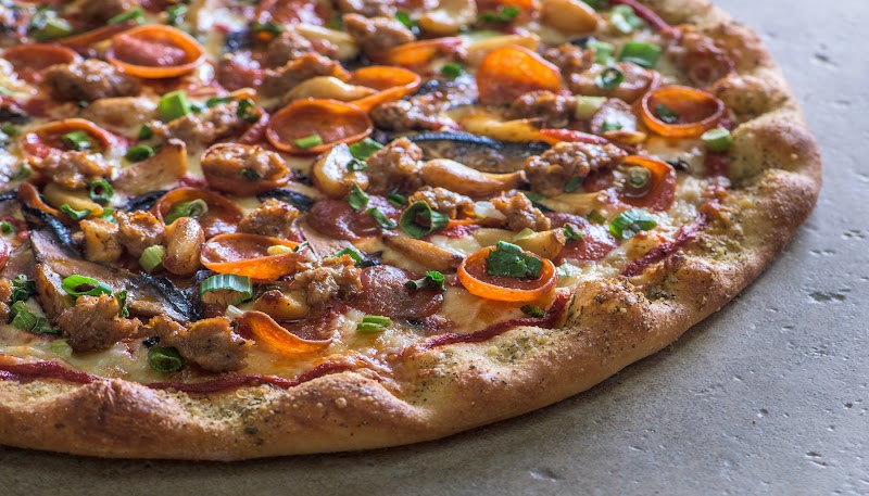 Loaded fresh toppings, crispy crust