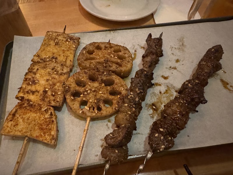 Grilled skewers on tray