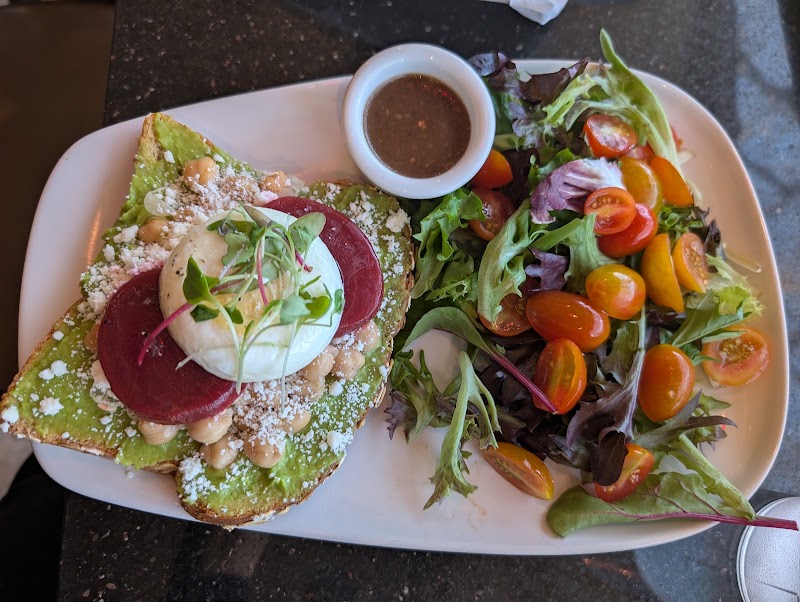 Fresh avocado toast with salad