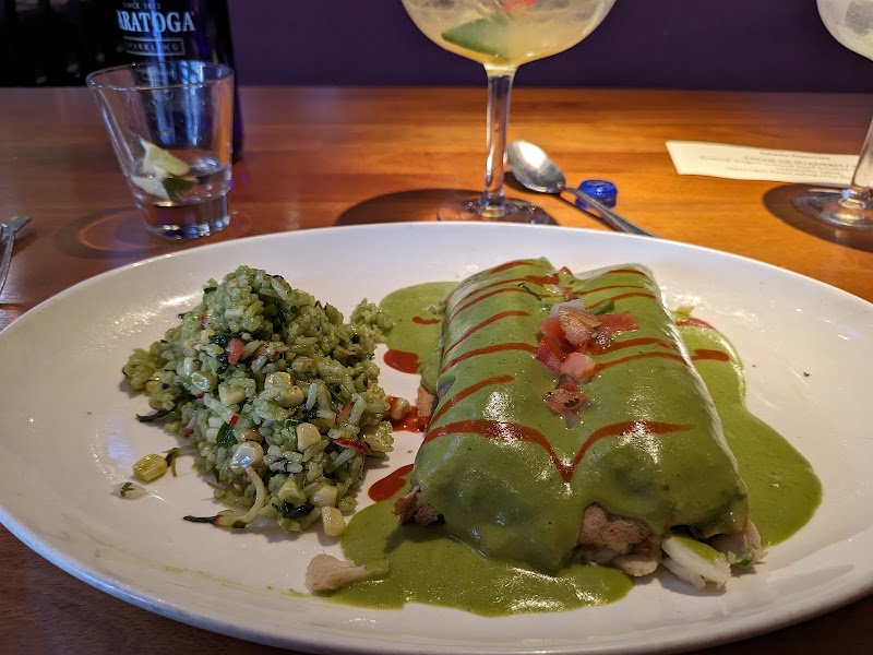Green-sauced enchiladas, herbed rice