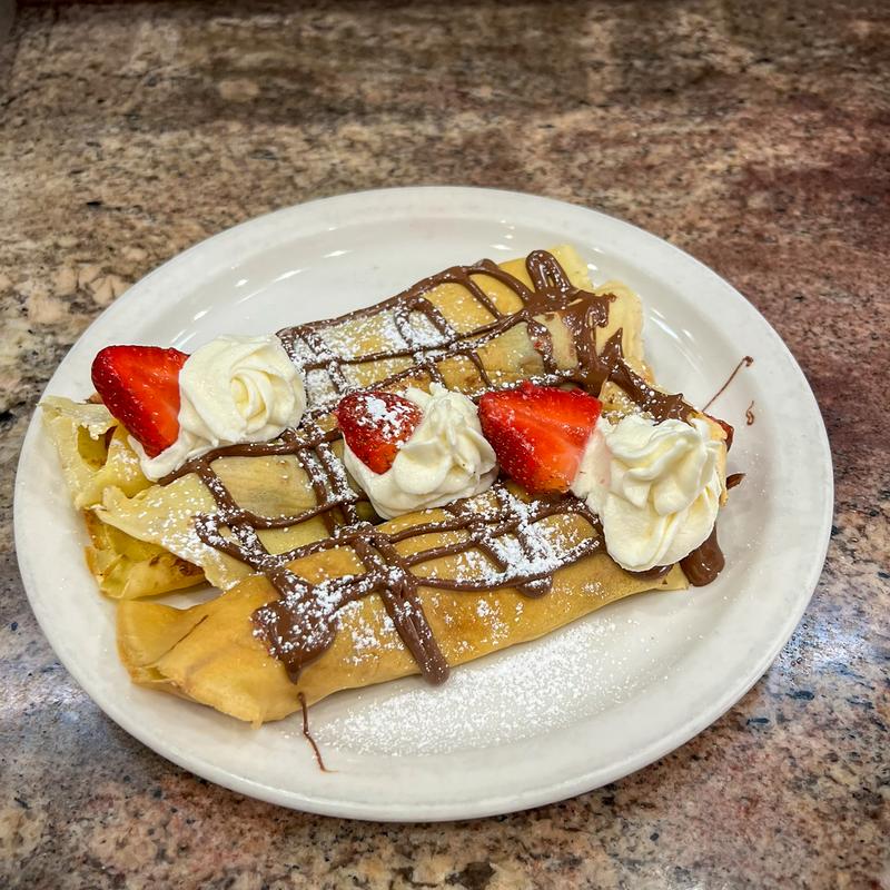 Crepes with strawberries and chocolate