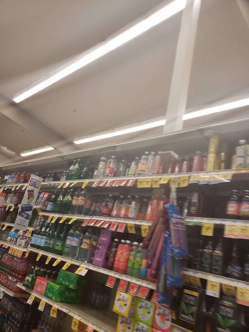 Stocked beverage aisle, sale prices