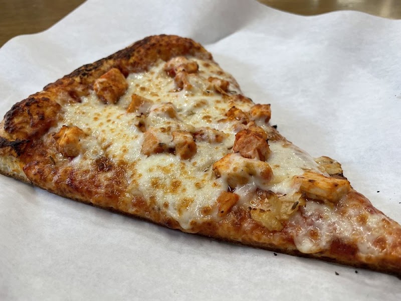 Golden chicken pizza slice
