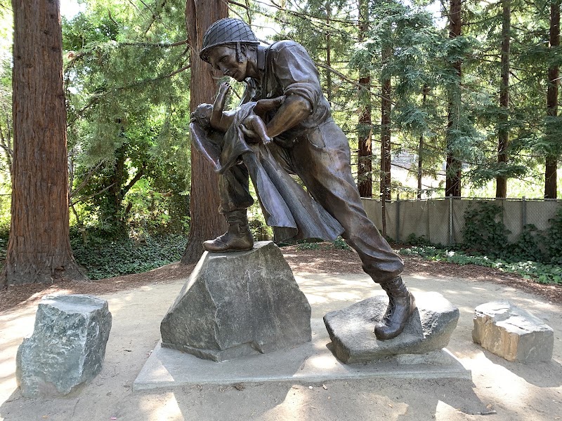 Veteran statue among redwoods