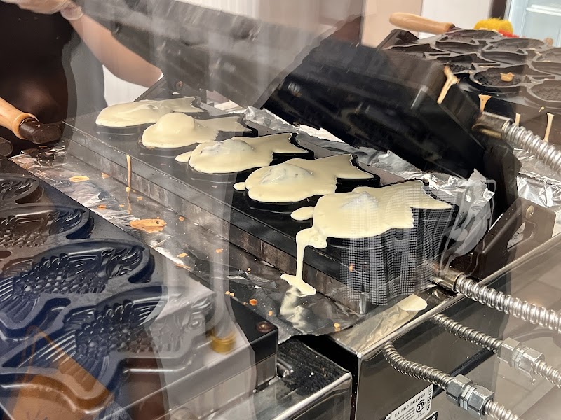 Taiyaki batter being pressed