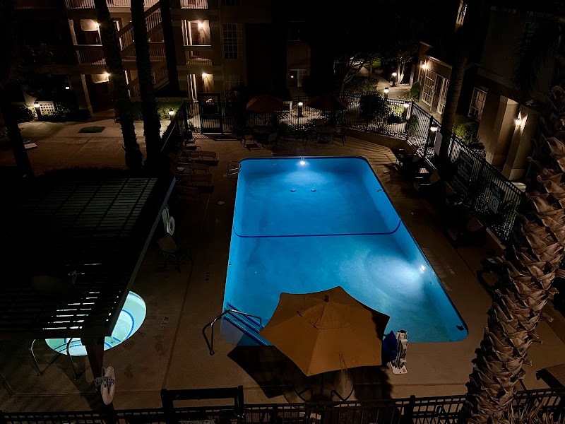 Relaxing pool courtyard at night