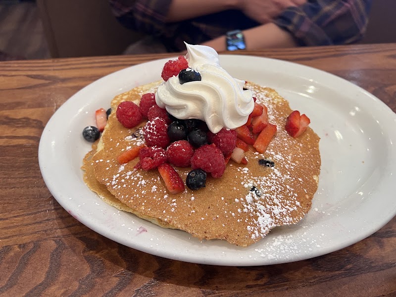 Berry pancakes, whipped cream