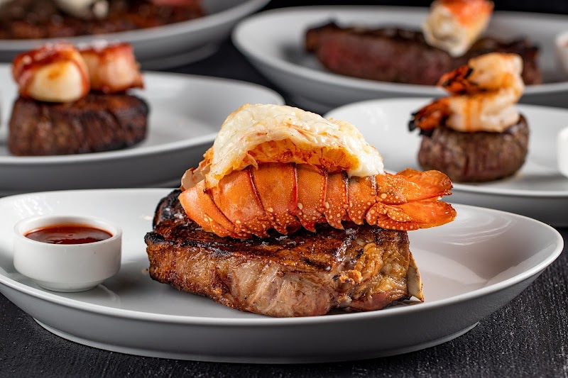 Steak topped with lobster