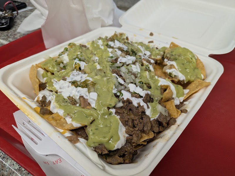 Heaping nachos, fully loaded