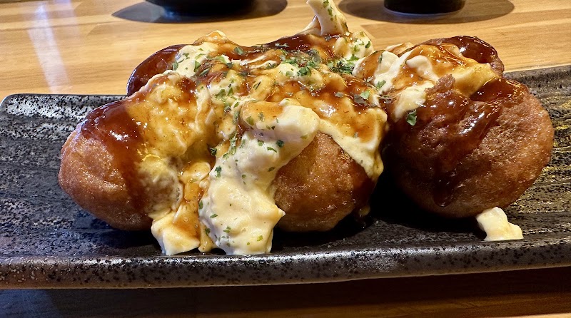 Takoyaki topped with egg salad