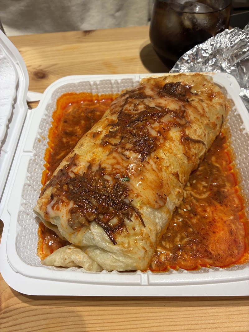 Smothered burrito in red sauce