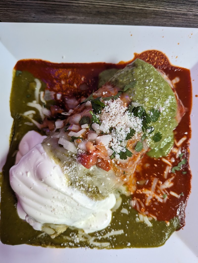 Saucy enchiladas, fully dressed