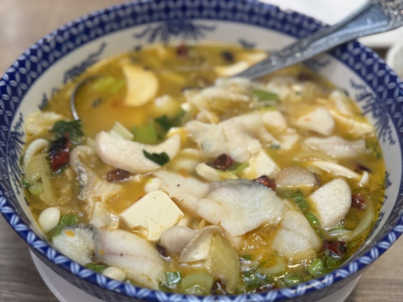 Silky fish in golden broth