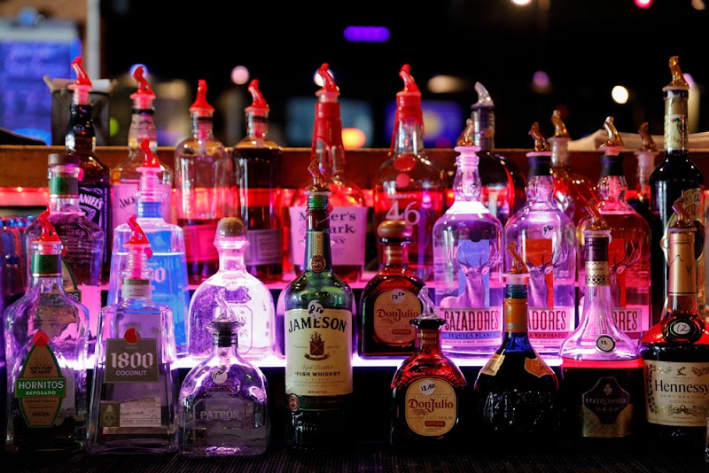 Full bar, glowing shelves