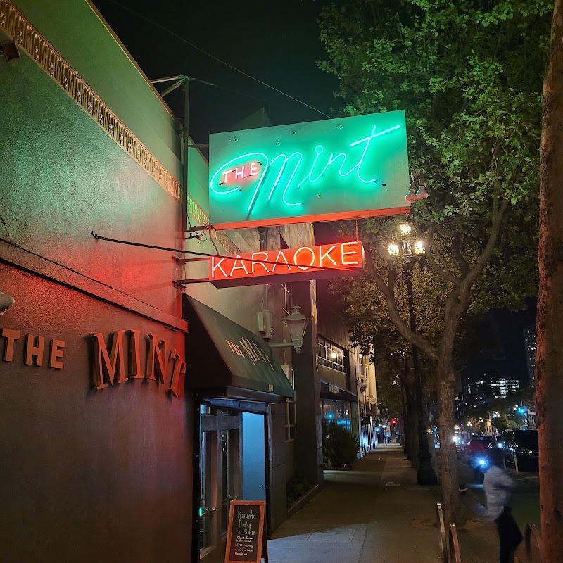 Neon signs glow at night