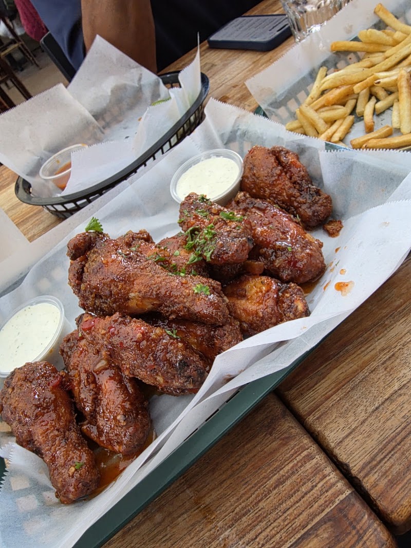 Saucy wings, crispy fries