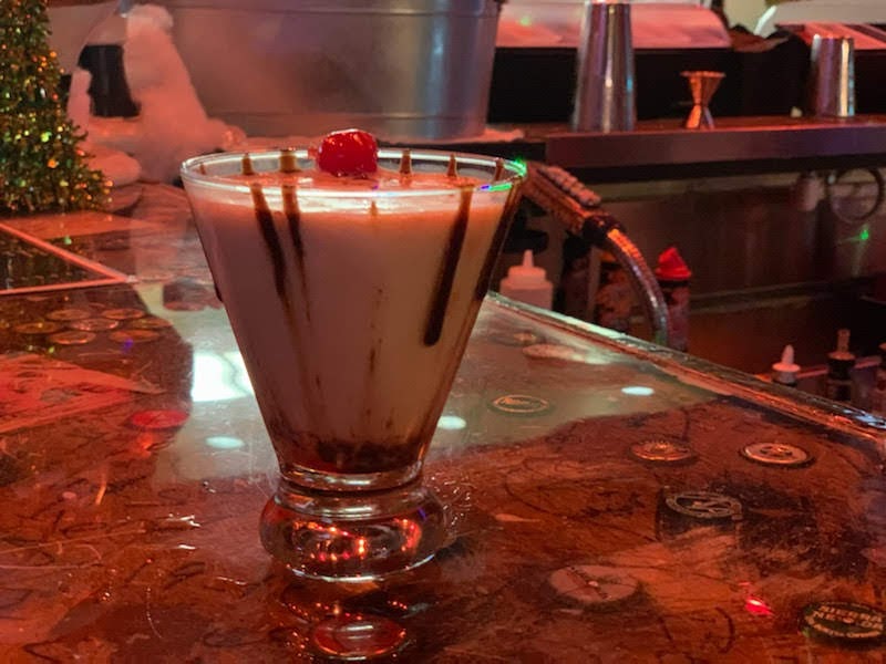 Creamy cocktail, chocolate drizzle