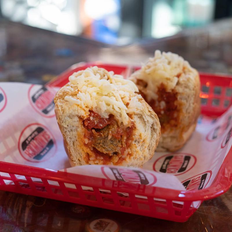 Hearty meatball sub, cheese topped