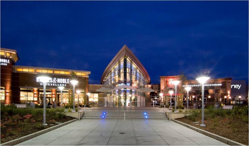 Welcoming mall entrance at dusk
