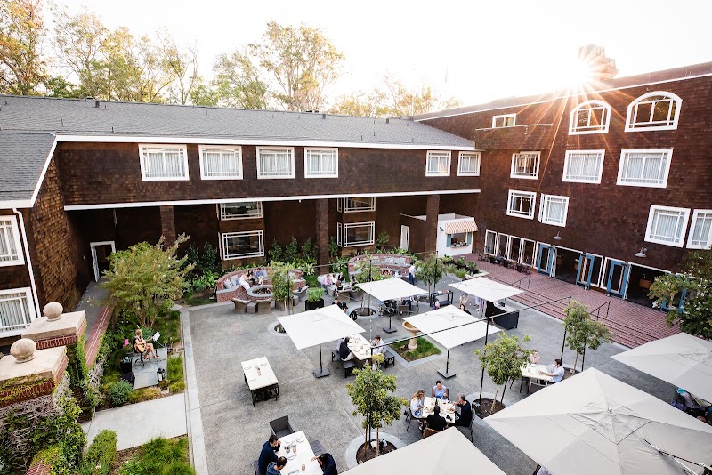 Sunlit courtyard dining terrace