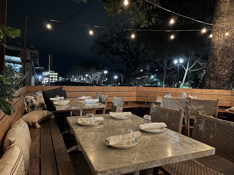 Candlelit patio dining at night