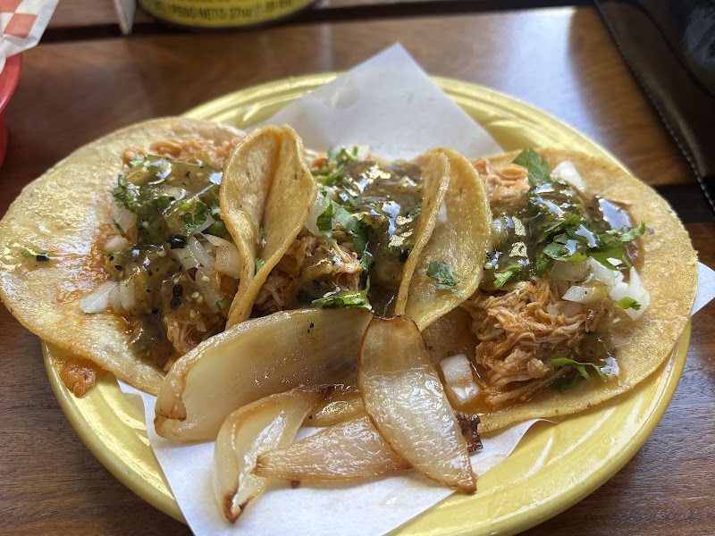 Saucy chicken tacos, served