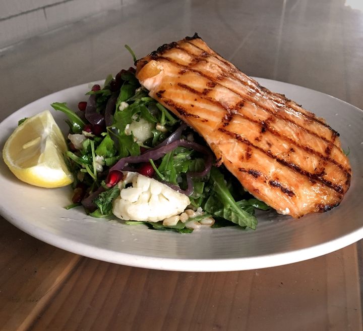 Seared salmon, crisp greens