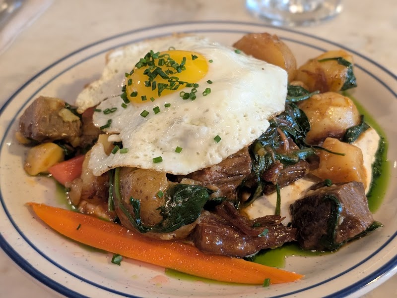 Savory hash, perfectly crowned egg