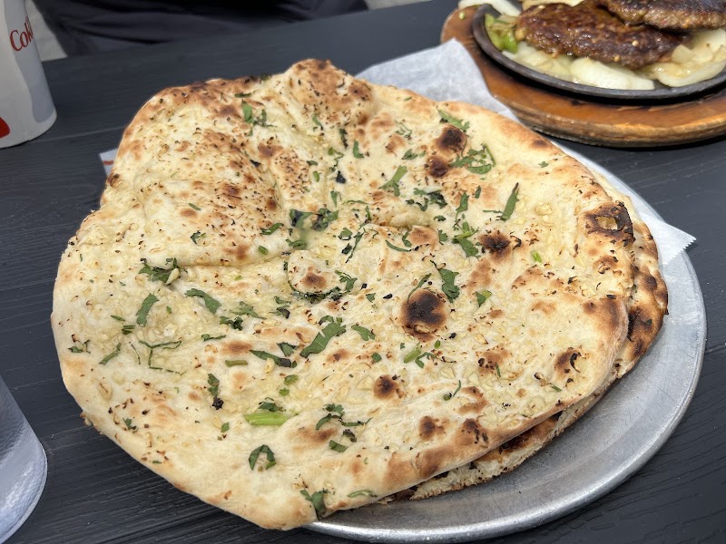 Fresh herb-flecked naan