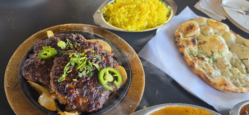 Sizzling kebab with naan